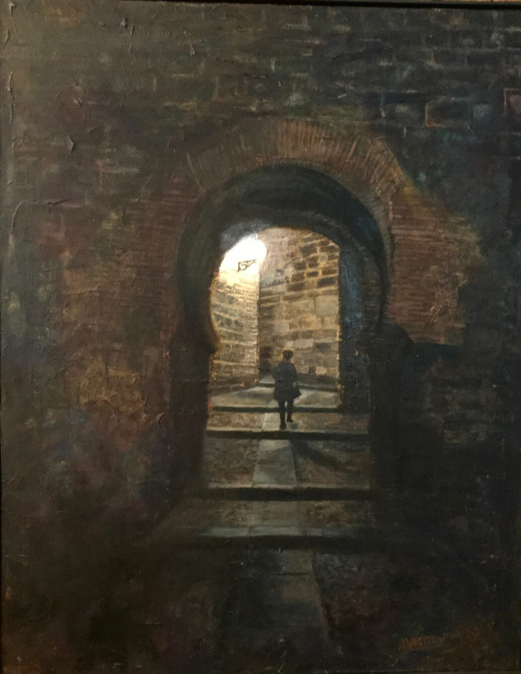 Toledo. Mujer bajo arco.